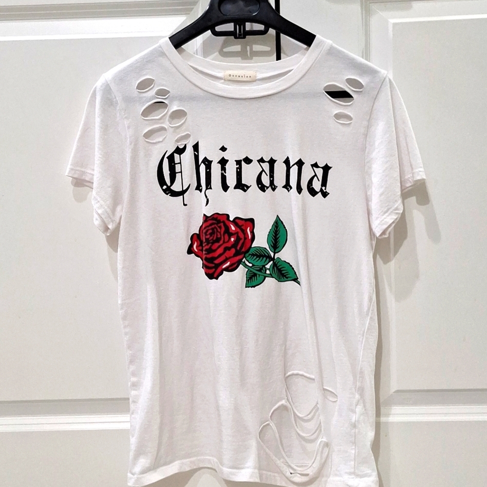 White chicana Shirt With rips and rose in the middle